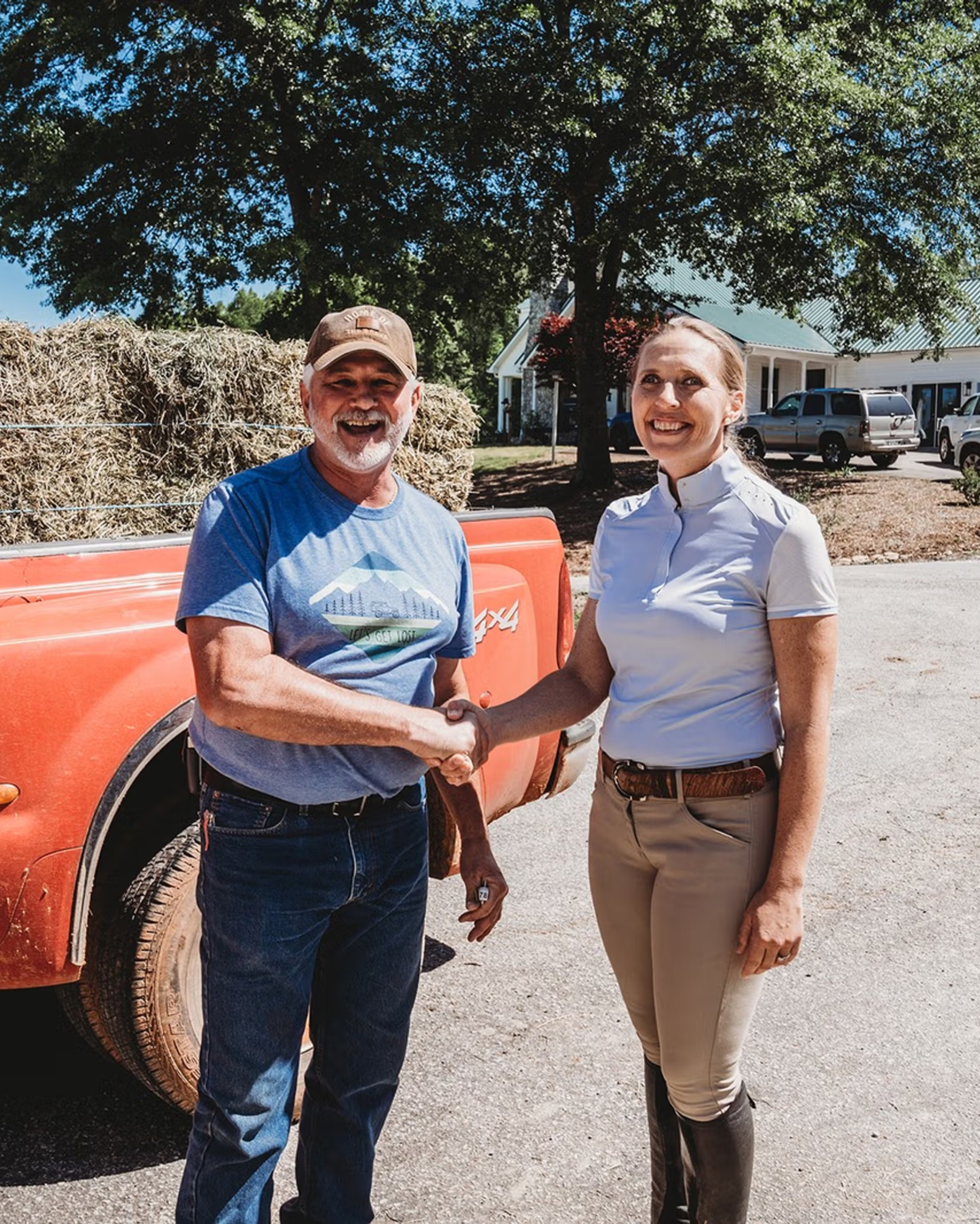 Nicole Miller, a farm nutrition business owner, standing on her farm