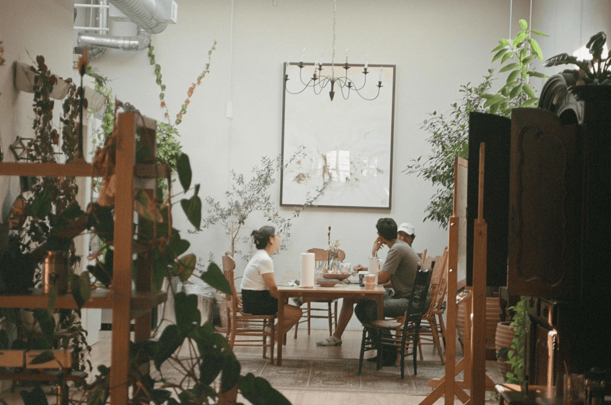 Team gathered around the office dining table