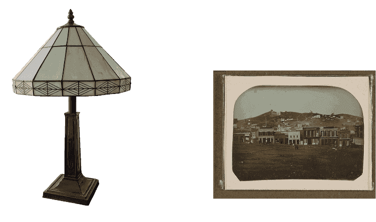 Office ephemera: a stained-glass table lamp and a framed vintage San Francisco cityscape
